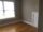 Empty room with large double window